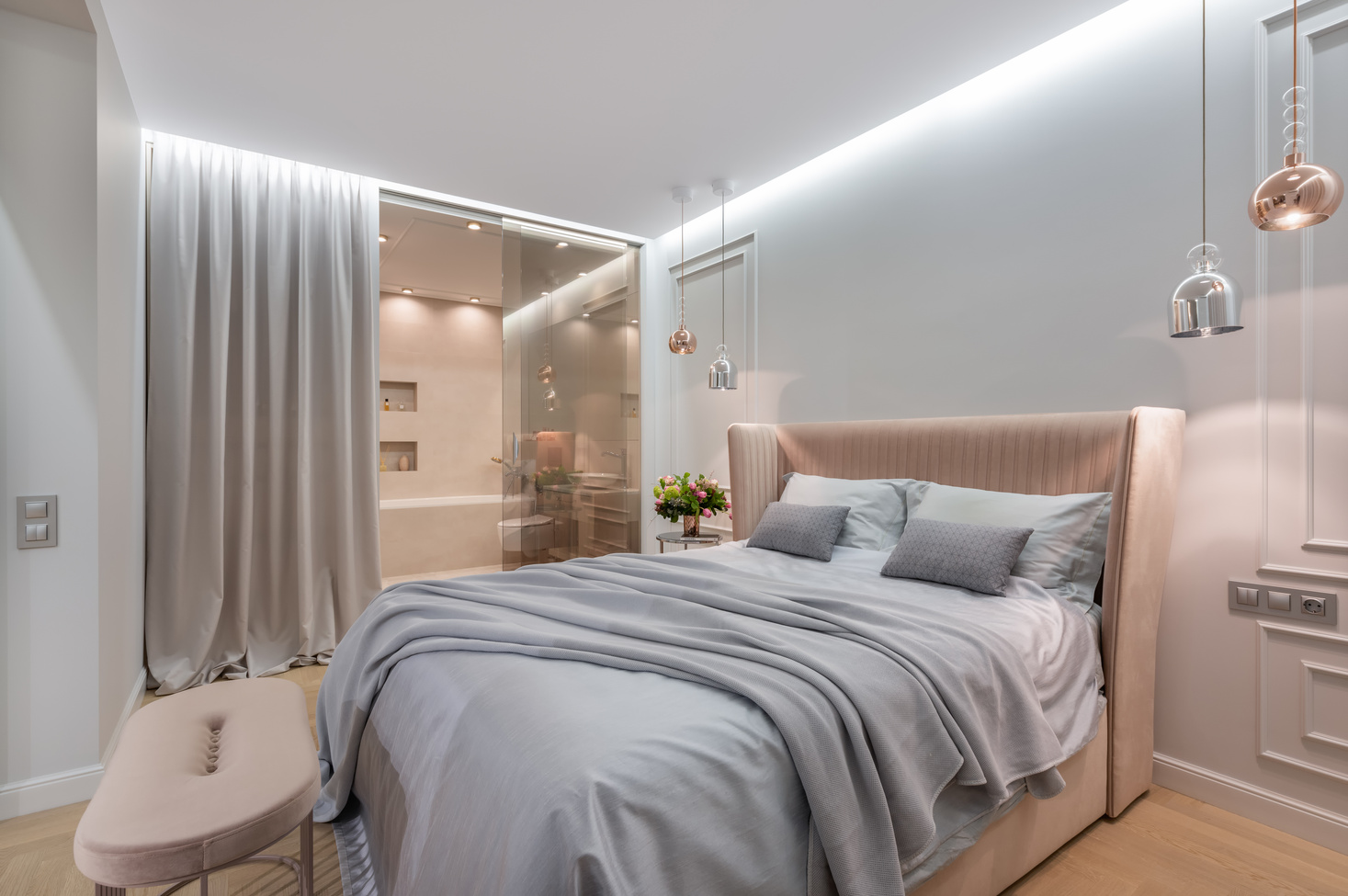 Bedroom interior with bed near pouf